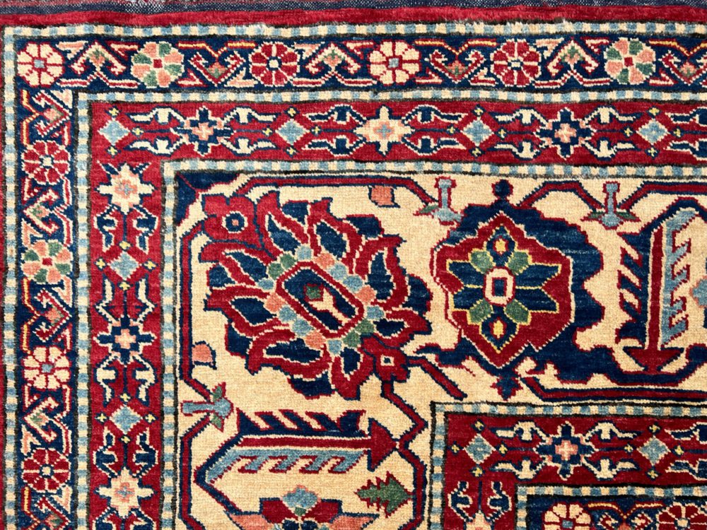 05518 Kazak Afghan Red White Blue 10-4x15-1 | Manoukian Rugs™ corner