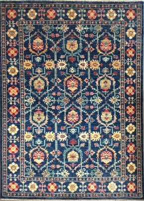 This hand knotted Afghan Araya rug lends a traditional feel to your favorite room. It carries floral design elements along with a pleasing balance of blue, red and yellow colors.