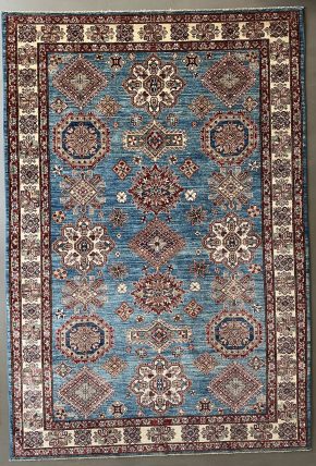 An Afghan Super Kazak Rug with Blue, Red, & Natural colors, sized 6-2x9-1 presented by Manoukian Rugs™